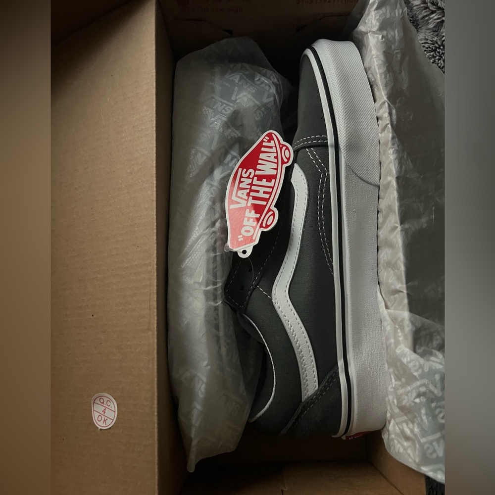 Gray Old School Vans.